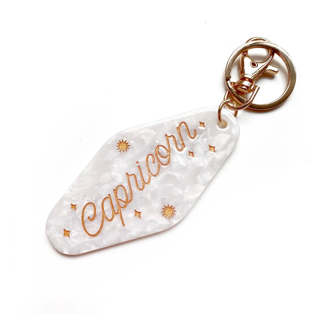 Horoscope Motel Keychain