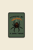 Hanging By A Thread Sticker